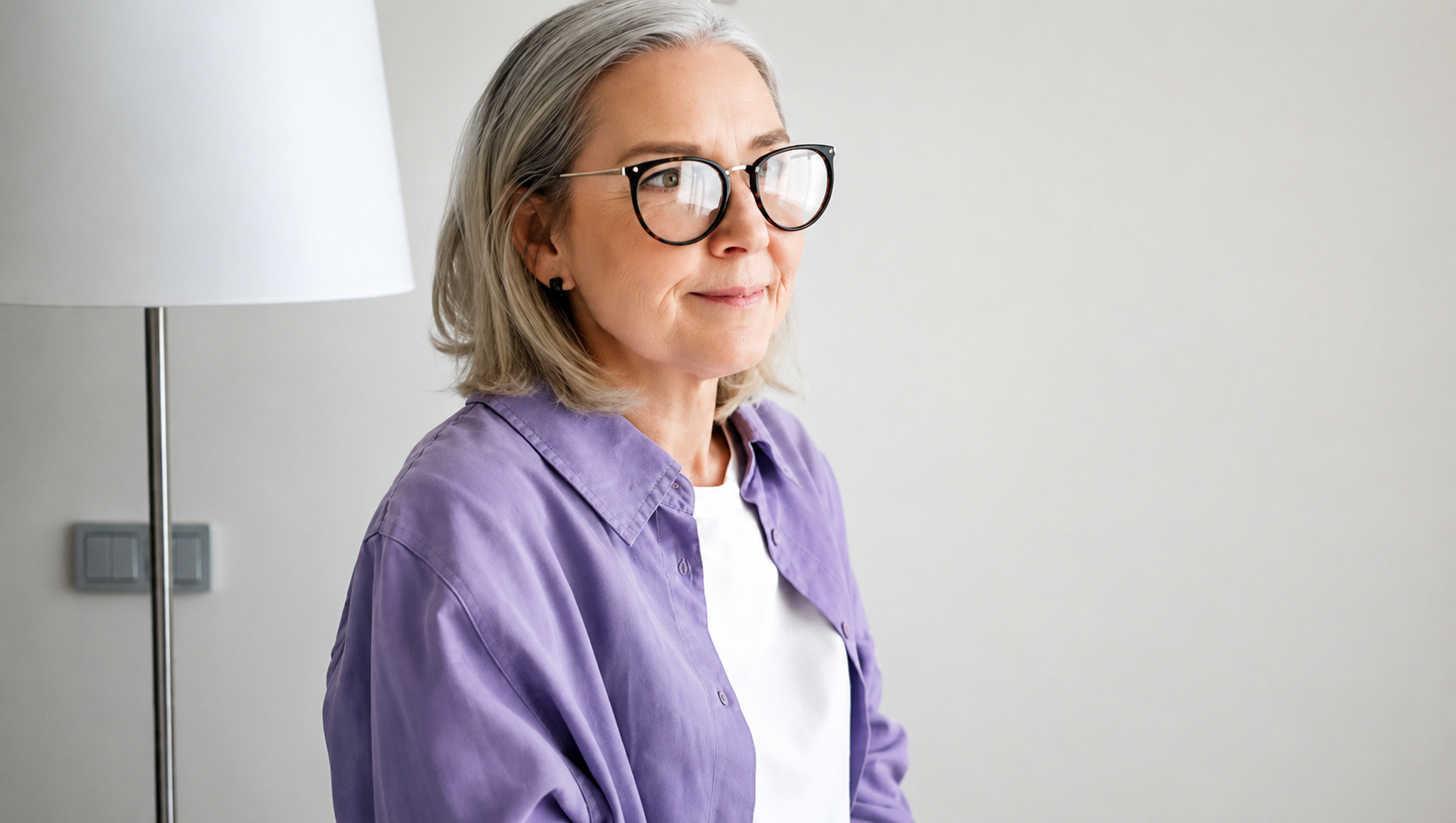 A woman reflecting quietly at home